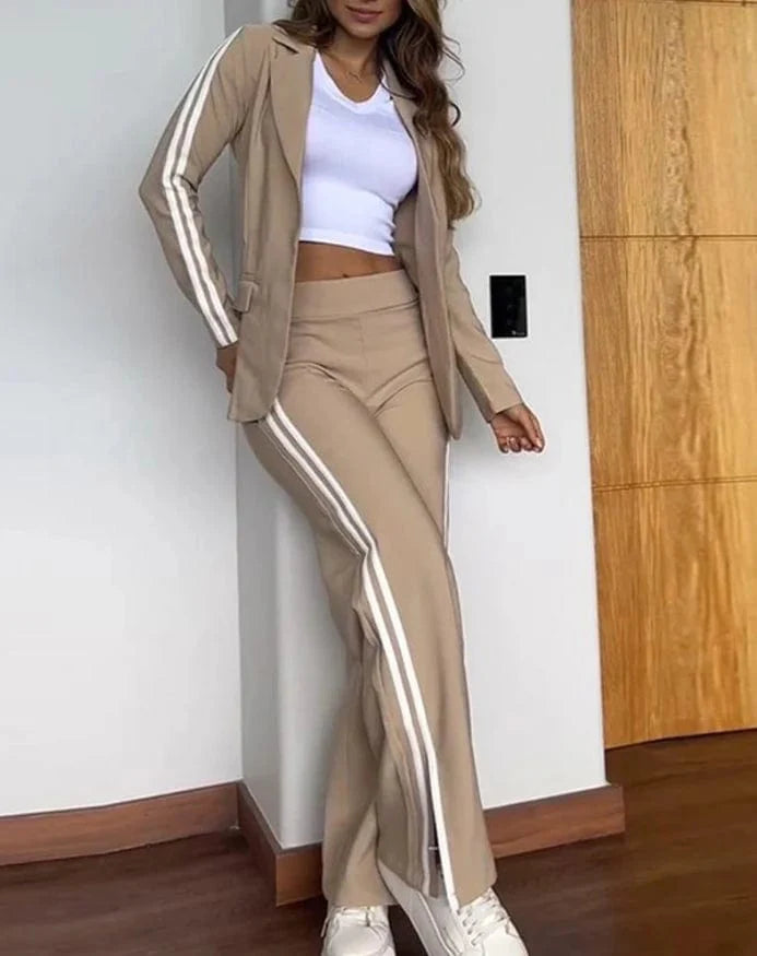 Elegant women's blazer and pants set by SHOWLU FASHION, featuring a notched collar, long sleeves, and button details for spring and summer.