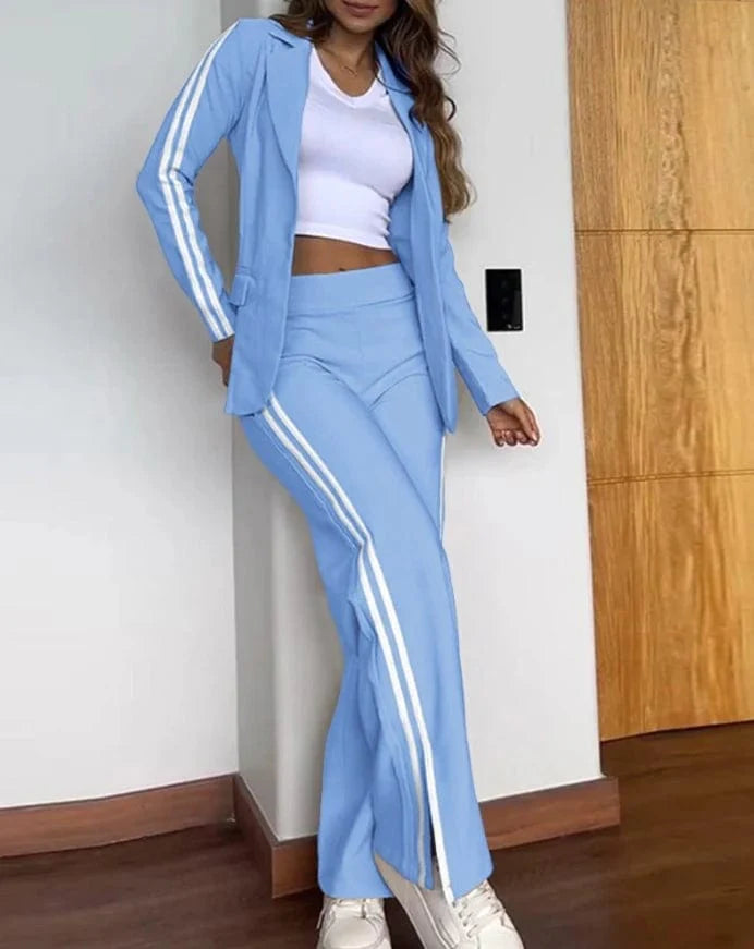 Elegant women's blazer and pants set with notched collar, long sleeves, and button details, perfect for spring and summer wear.