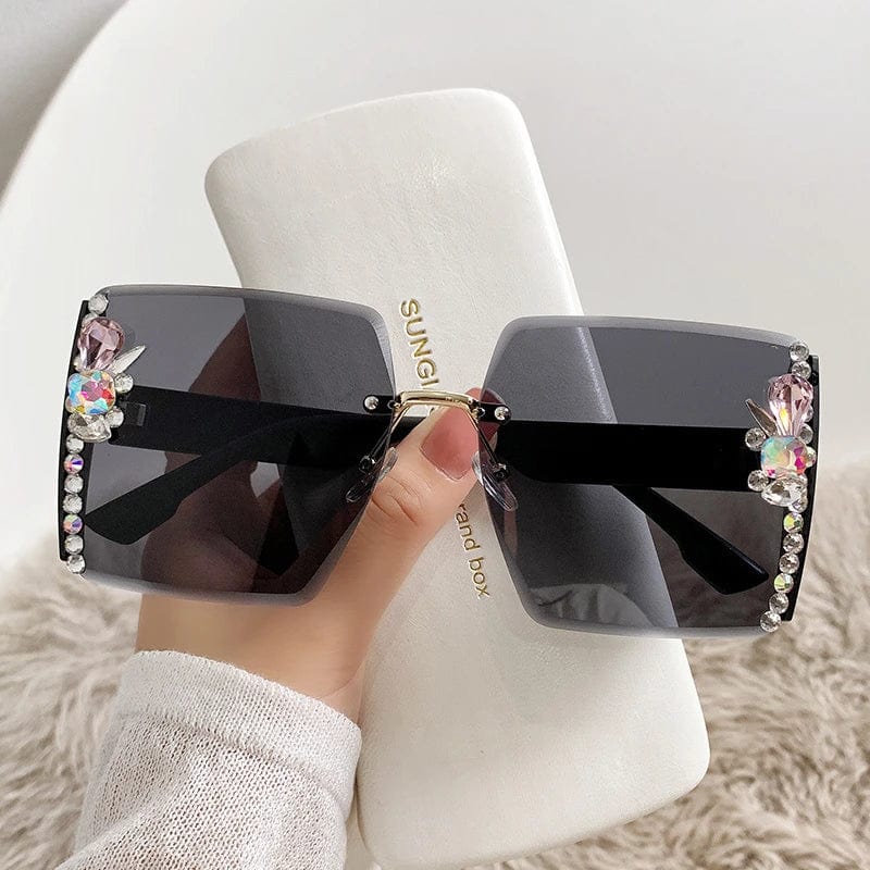 Black Y2K heart-shaped sunglasses with diamond effect and UV400 protection, stylish resin eyewear for women by Showlu Fashion Store.