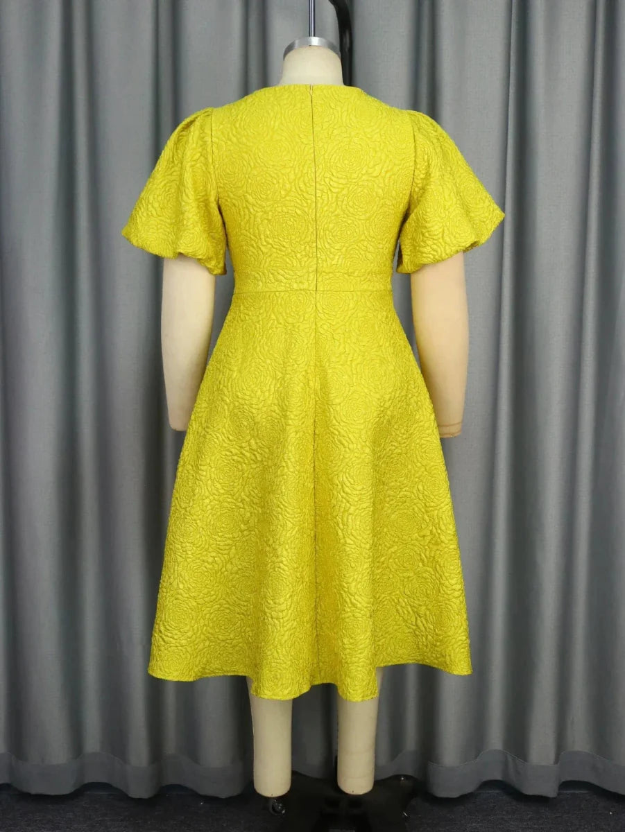 Yellow AOMEI Jacquard Midi Dress with 3D flower details, puff sleeves, high waist, and A-line silhouette, perfect for elegant or casual occasions.
