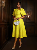 Yellow jacquard A-line midi dress with 3D flower details and puff sleeves, elegant high-waist gown for women.