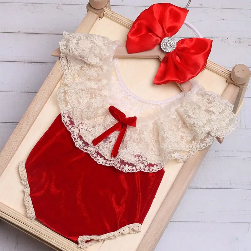 Baby girl in Ylsteed lace romper and matching bow headband, perfect for Christmas photos and special occasions.