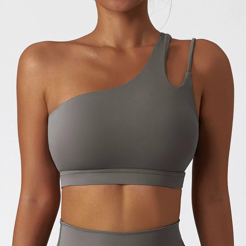 Showlu Fashion women's nylon yoga sports bra with full cups, designed for running and workout activities.